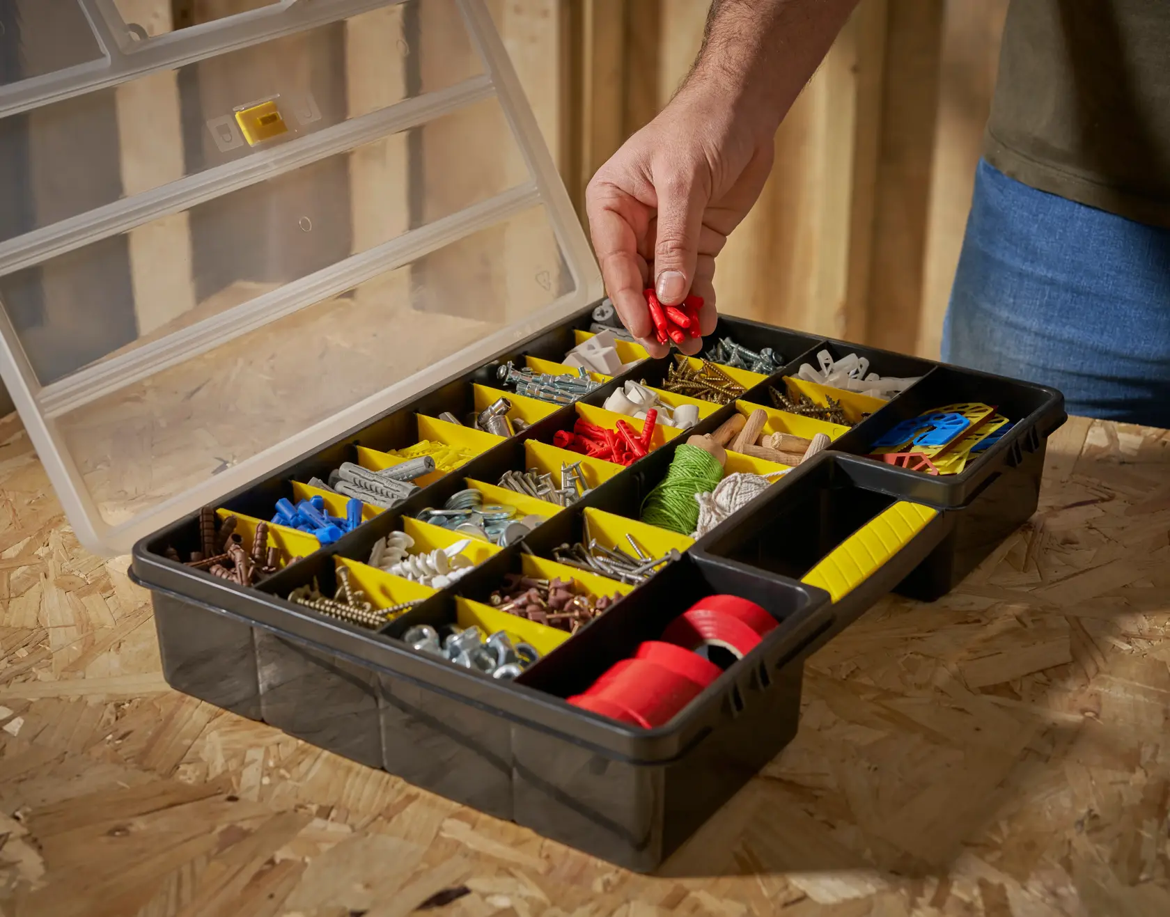 STANLEY 1-92-762 organizer box with yellow dividers, filled with assorted hardware, photo from above.