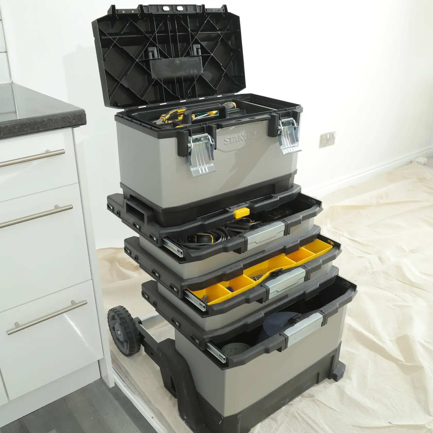 STANLEY 1-95-622 photography of wheeled modular tool box stack open in indoor workspace.