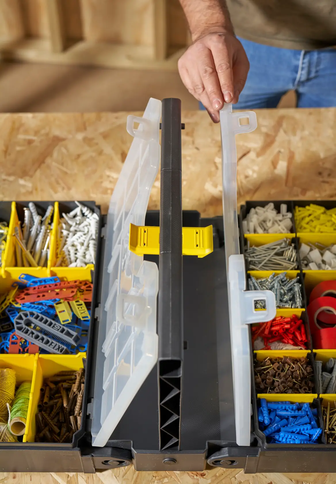 STANLEY STST1-71963 organizer with clear lid, multiple compartments, and assorted hardware viewed from above.